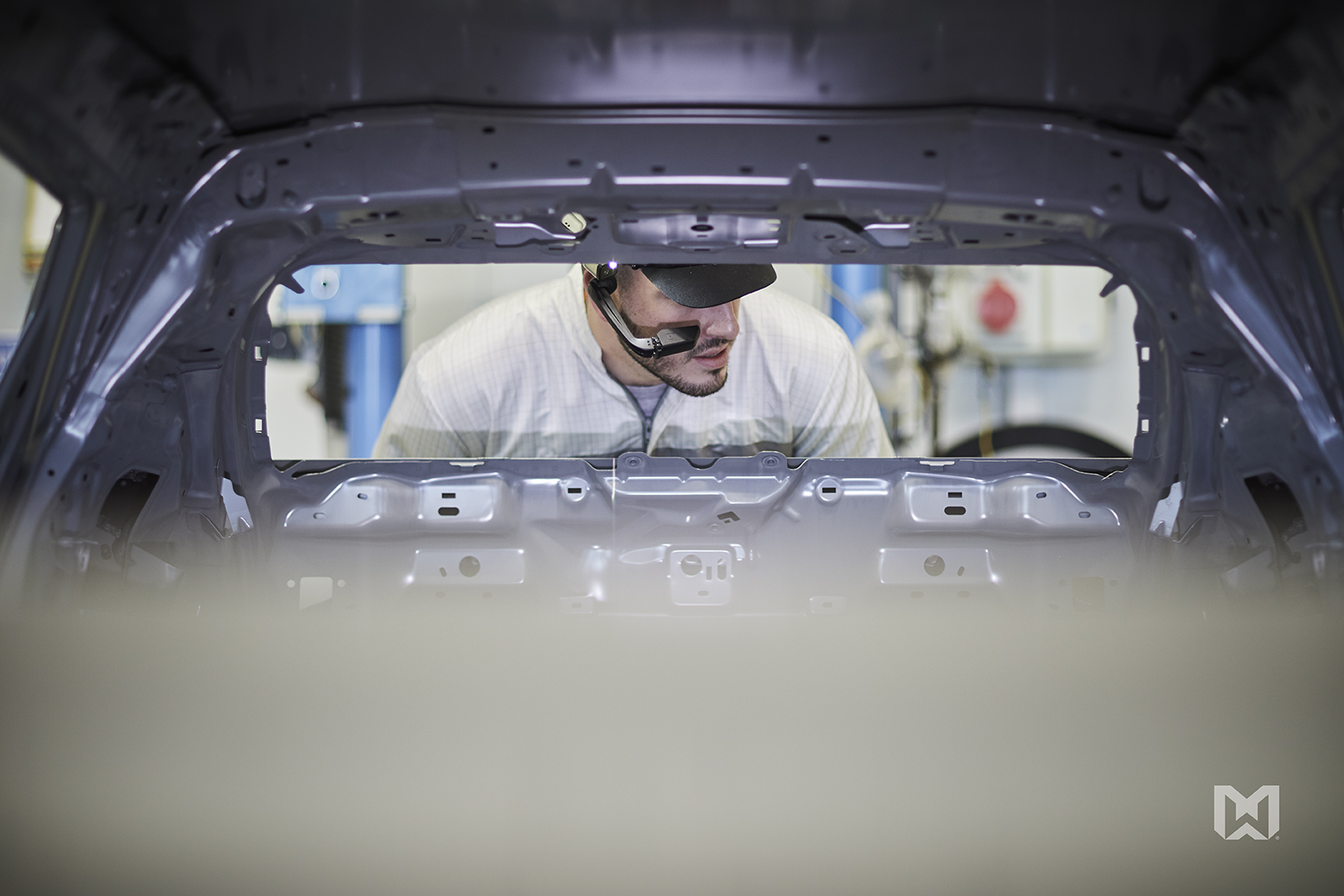 Groupe PSA worker inspects vehicle with RealWear HMT-1